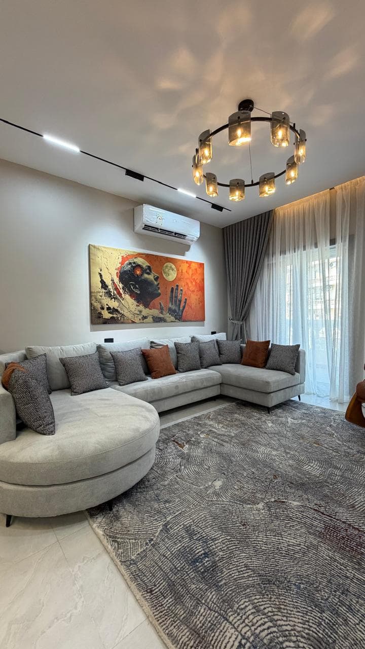 Bright rental living room with large windows